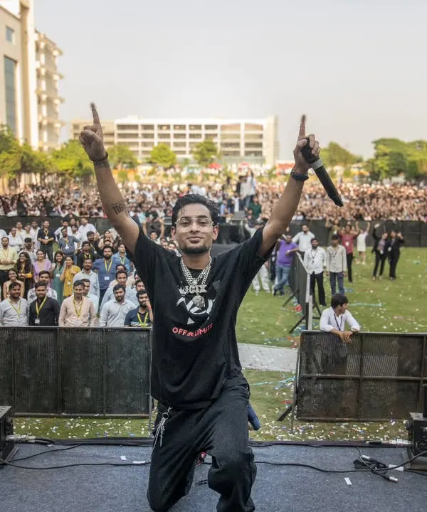 Commanding the stage and connecting with a massive crowd at a university fest. This is the energy I bring to every large scale concert and open air event.