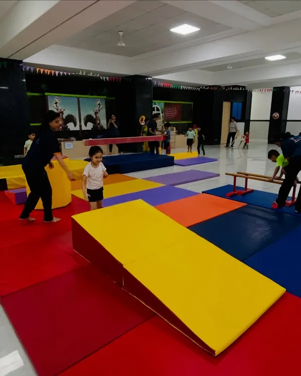 An overview of our new branch in Kandivali East. The facility is set up with colorful mats of varying thickness and inclines, creating a safe and versatile space for toddlers and kids to train.