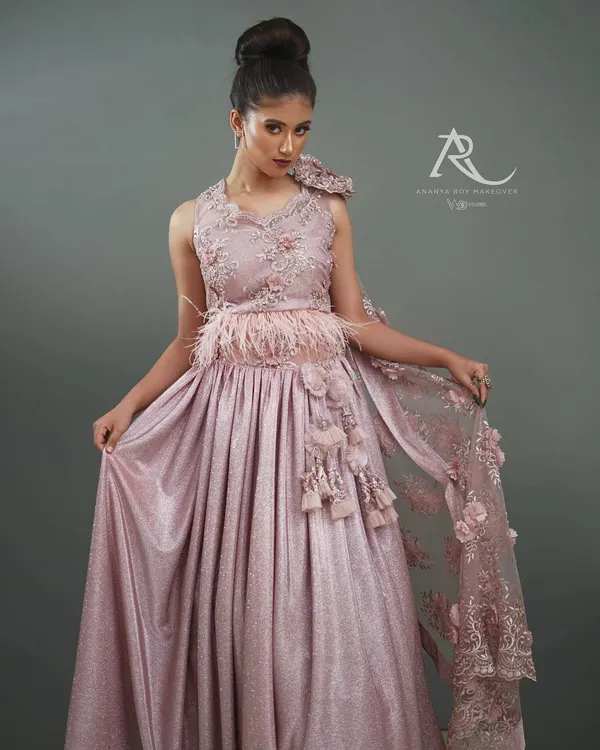 This full-length shot is essential for any lookbook, clearly presenting the entire silhouette of the designer gown. I used balanced studio lighting to ensure the color is accurate and every detail, from the feathered waist to the embroidered dupatta, is visible.
