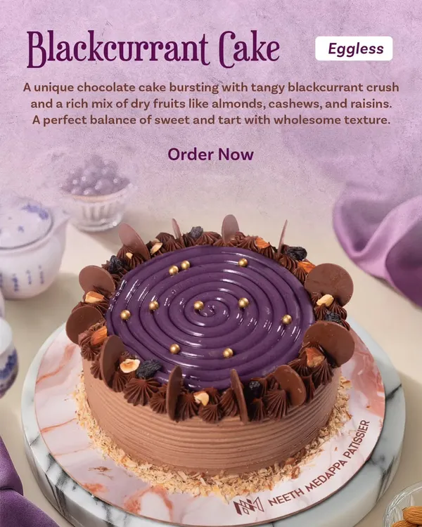 Sweet meets tangy in our Blackcurrant Cake. This eggless chocolate cake is bursting with a tangy blackcurrant crush and a rich mix of dry fruits like almonds, cashews, and raisins.