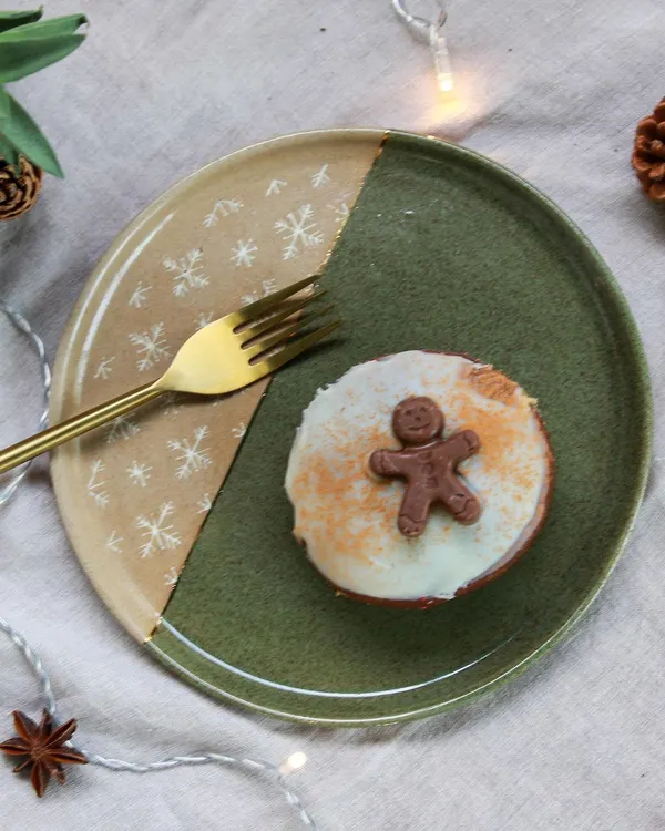 A festive plate from my Christmas collection, featuring a two-tone glaze and a delicate snowflake pattern. Perfect for serving holiday treats.