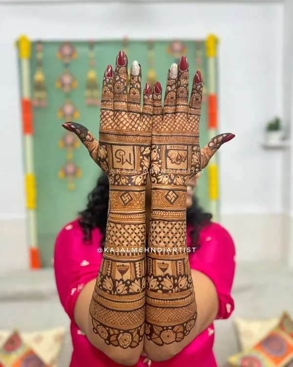 A stunning full-backhand bridal design. The intricate geometric patterns, floral bands, and auspicious symbols create a dense and beautiful look.