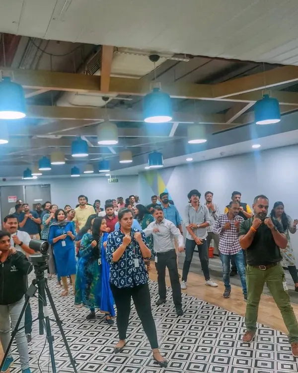 Employees at Lenovo participating in a group drill, learning the basic fighting stance. Our corporate workshops are interactive and get everyone involved.