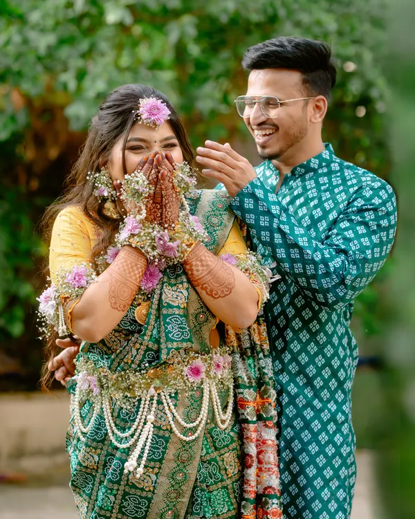 A candid, joyous moment from a traditional baby shower. Capturing genuine laughter and interactions like this is what makes event photography so special.