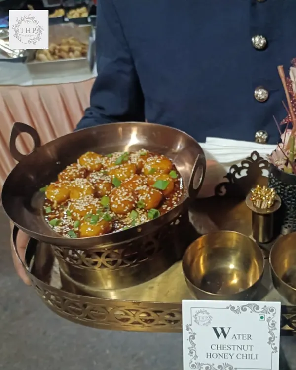Our Water Chestnut Honey Chili is a perfect blend of sweet and spicy. Served by our professional staff, this dish is a unique and flavorful starter for any corporate event or party.