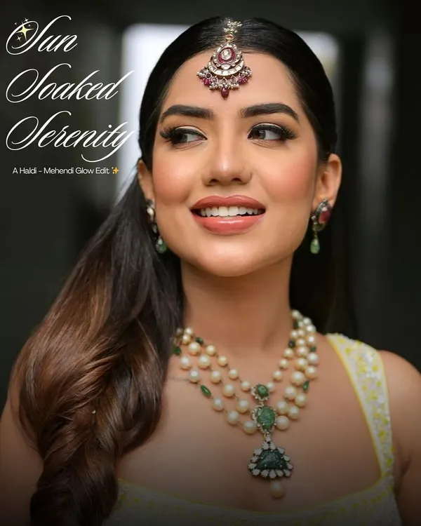 If soft glam had a haldi version, this would be it. This sun-soaked serenity look is all about a dewy, peachy glow that perfectly matches the marigold dreams of a haldi ceremony.