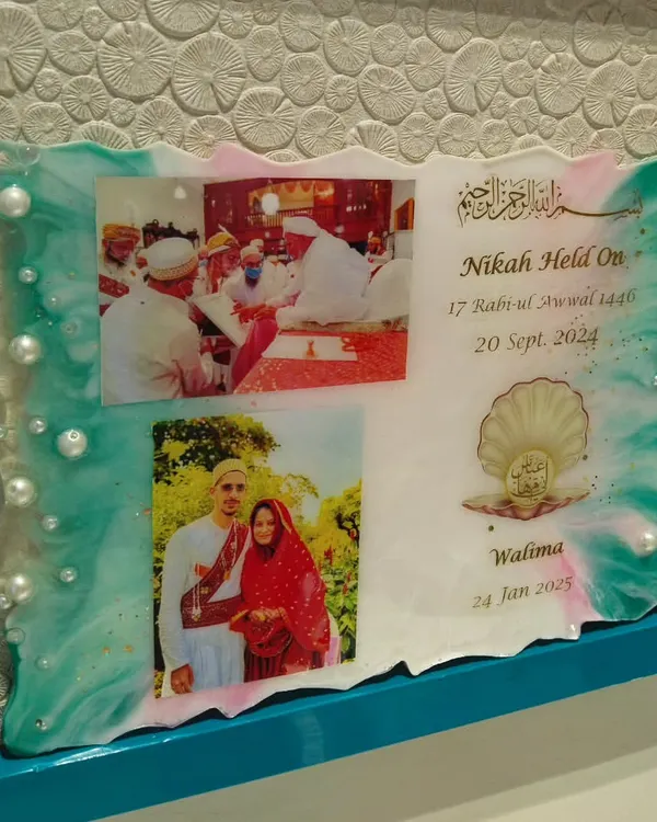A truly unique resin wedding invitation or 'Nikah' plaque. It preserves your photos and event details in a beautiful, permanent display piece decorated with pearls and custom colors.