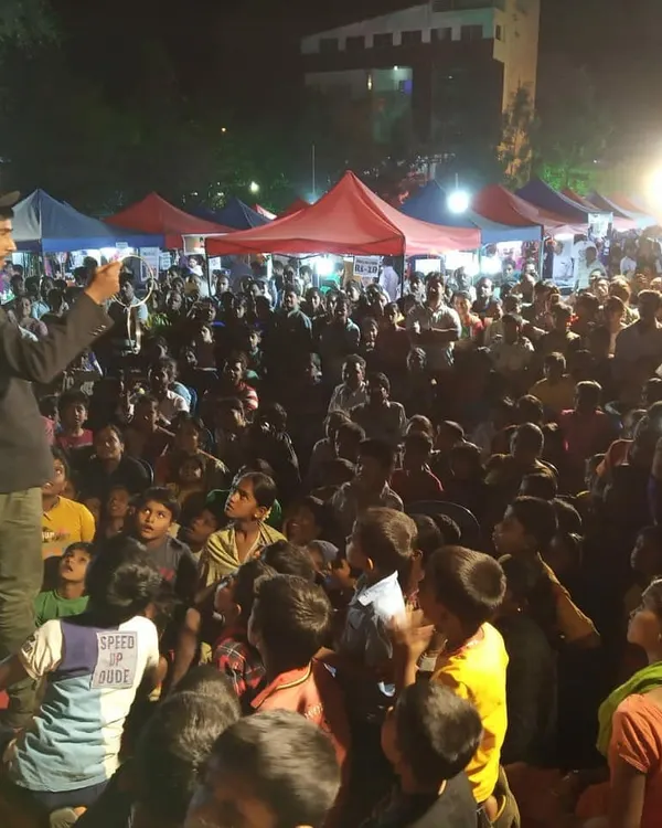 There's no better feeling than connecting with a huge crowd! Here I am at a public festival in Nagarbhavi, Bangalore, sharing some laughs and interactive magic with hundreds of people. This is what my high-energy stage show is all about.