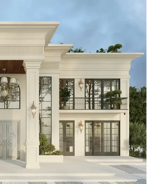 A closer look at the detailing on our 2.5-acre signature estate. This view highlights the intricate mouldings, wrought-iron balcony railings, and the warm glow of the brass-finished wall sconces against the clean, micro-concrete finish.
