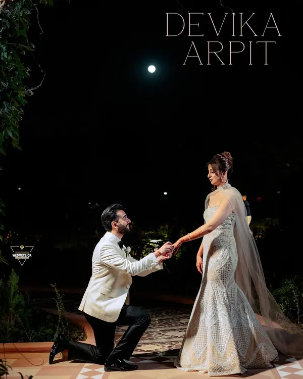 A proposal under the moonlight. For this shot, we created a truly cinematic and romantic scene. The dramatic lighting and elegant attire come together to create a powerful, emotional portrait that feels like a still from a classic film.
