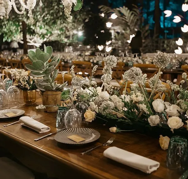 A 7-course wedding dinner in the middle of a Coorg forest in peak winter. We set up a functional satellite kitchen and meticulously planned every detail, from the tablescapes with white florals and succulents to the temperature of each course.