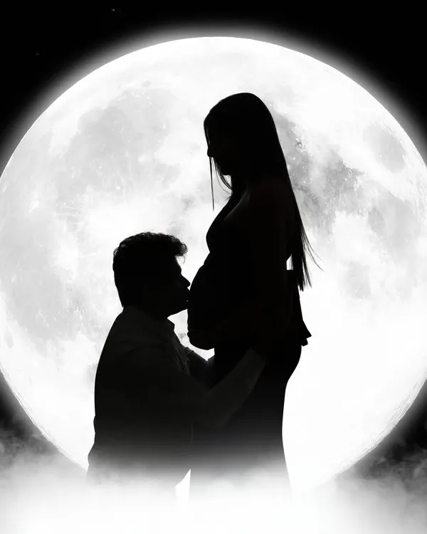 Under the moon, we await our little star. This beautiful silhouette of a couple captures the magic and romance of waiting for a new life to begin.