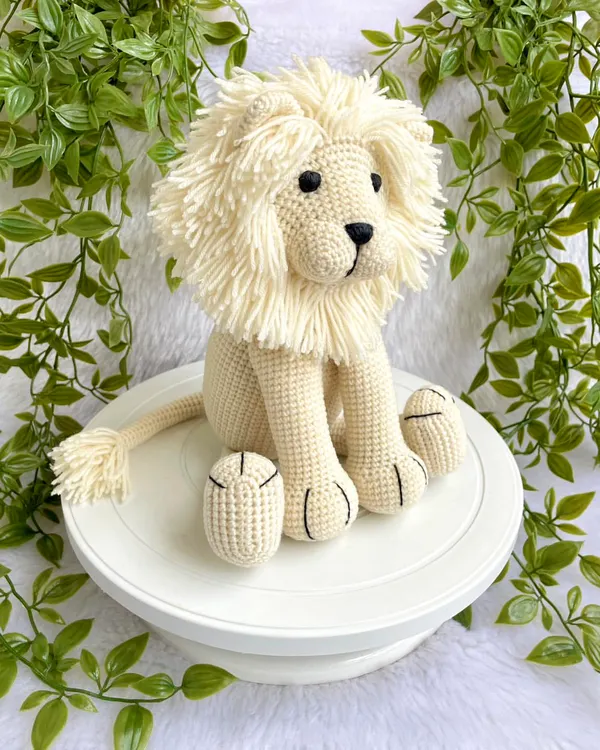 This majestic white lion has such a beautiful, full mane. I designed him in a sitting position, making him a wonderful and regal-looking plushie for a shelf or bed.