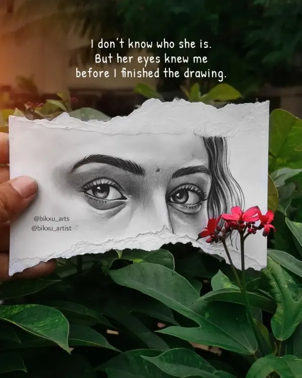 Sometimes the art tells its own story. This is a creative piece showing a hyper-realistic eye drawing on torn paper, held against a natural background.