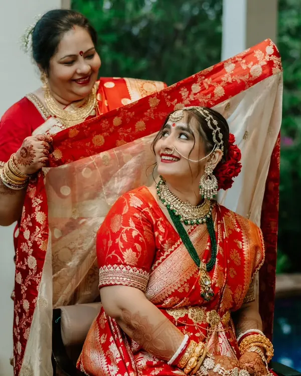 A heartwarming moment between a bride and her mother, for whom I had the pleasure of doing hair and makeup. Her look was classic and elegant for this traditional Bengali wedding.