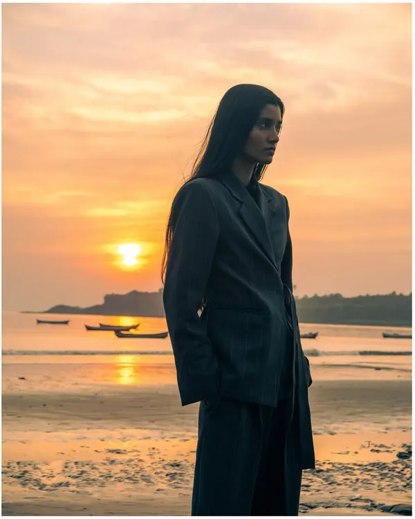 A different angle from the sunset beach shoot. This profile shot captures a more contemplative mood, with the warm light of the setting sun creating a beautiful rim light.