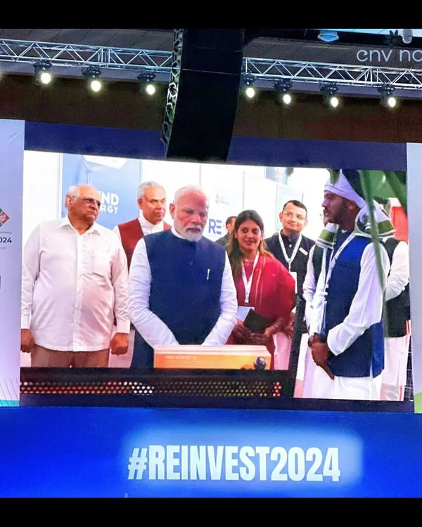A powerful image from Re-Invest 2024, where our interaction with Honorable Prime Minister Shri Narendra Modi was featured on the main event screen. This highlights the national significance of our work in Ayodhya and the renewable energy sector.