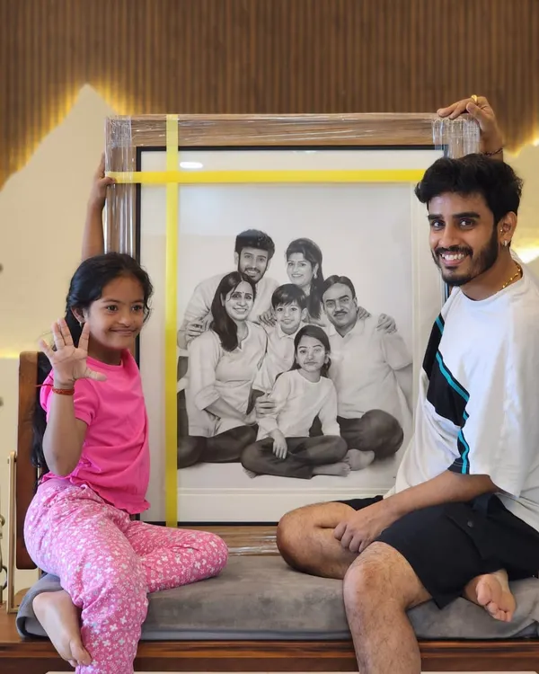 This is what it's all about. Seeing a family's joy as they unbox a portrait that took me over 75 hours to create. This large-scale piece was a composite, bringing together six family members from three different photographs into one shared memory.