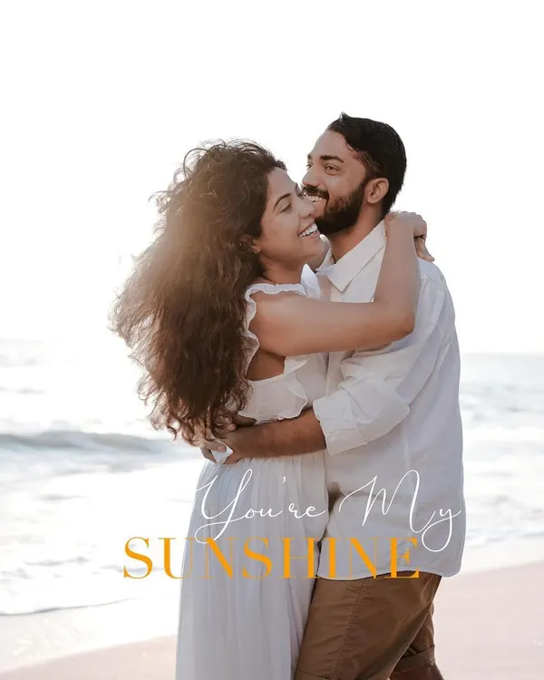 A sun-kissed embrace on the beach, a perfect "you're my sunshine" moment. Pre-wedding shoots like this are a wonderful way to capture your love story in a beautiful, natural setting.