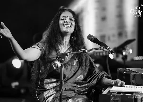 A magical night performing at the Bengaluru Ganesh Utsava. This black and white photo captures the emotion of being lost in song, even on a large stage.