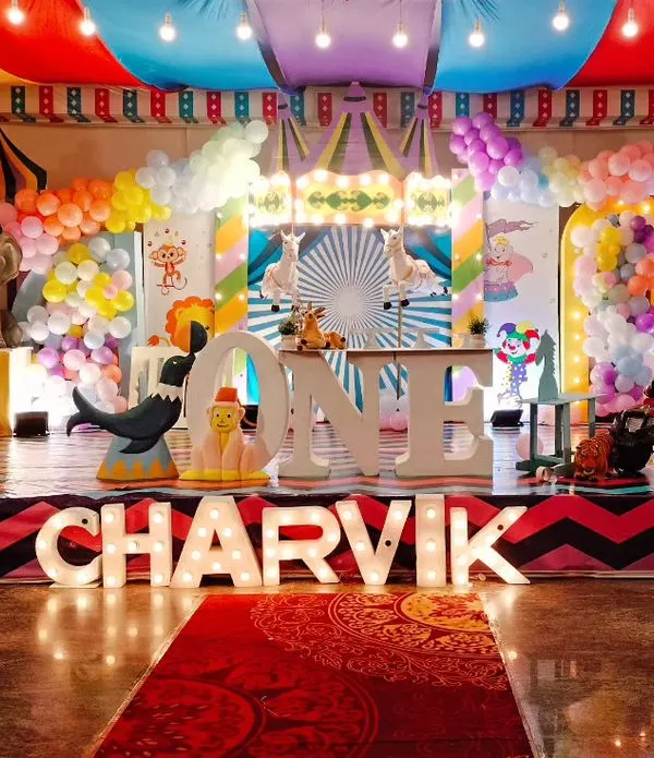We brought the magic of the circus to life with this grand carnival theme for a first birthday. This large-scale setup features a custom big top tent, colorful draping, and multiple themed stations, showing our capability to transform any venue into a world of wonder.