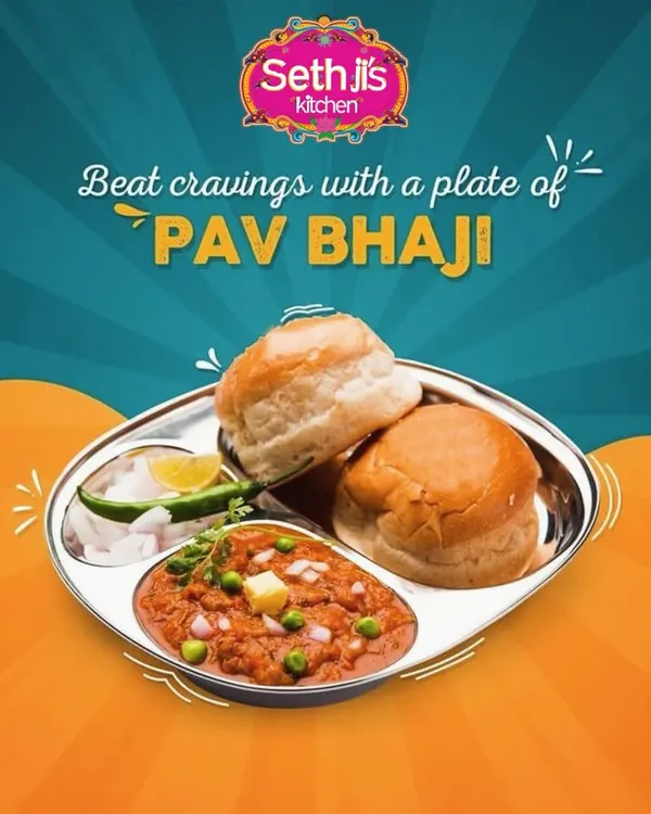 Our delicious Pav Bhaji, plated and ready to eat. The rich, buttery bhaji is served with soft pav buns, chopped onions, and a slice of lime.