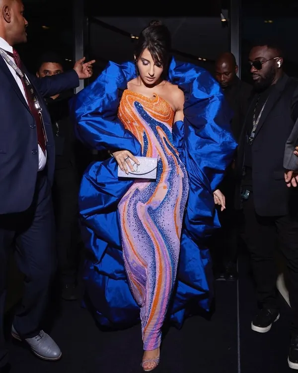 For Nora Fatehi's main IIFA 2023 appearance, we went for high drama with this structural Jean-Pierre Khoury gown. The voluminous royal blue wrap over a psychedelic-print catsuit was a bold fashion choice that truly owned the carpet.