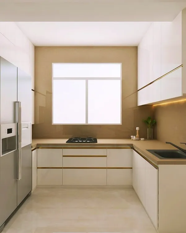 A classic and elegant kitchen design. The combination of white high-gloss cabinets with subtle gold-profile handles creates a look that is both timeless and luxurious.