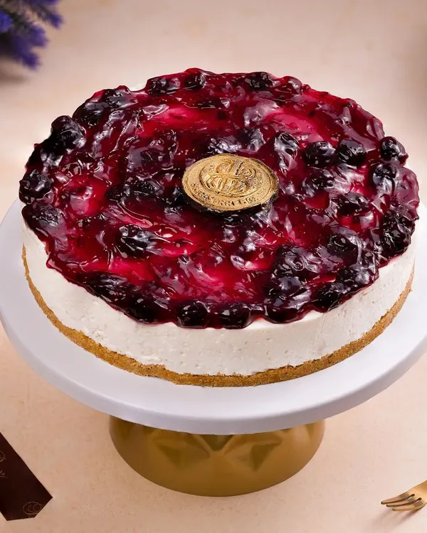 A beautiful blueberry cheesecake, styled to perfection. We focus on capturing the glossy topping and creamy texture, making it an irresistible choice for any dessert lover.