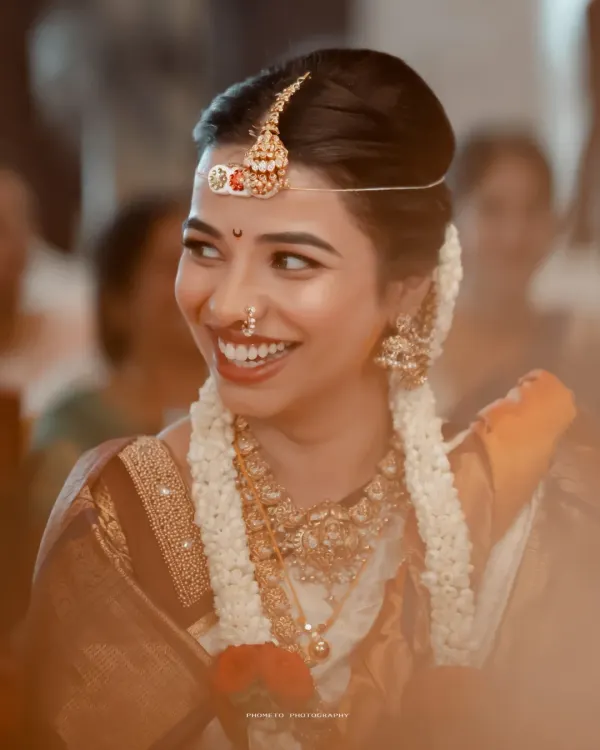 A smile that lights up the room. We capture the pure, unfiltered joy of a bride on her wedding day.