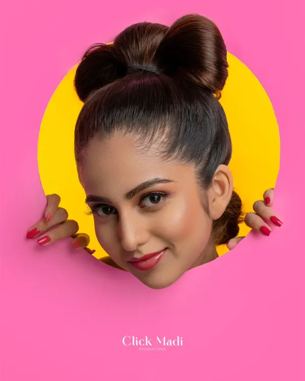 This is what I mean by making your presence pop. In this studio portrait, I used bold, contrasting colors and a creative paper cutout to frame the model's face, creating a playful yet high-fashion look. It’s a perfect example of how I build a portfolio that is vibrant, modern, and impossible to ignore.