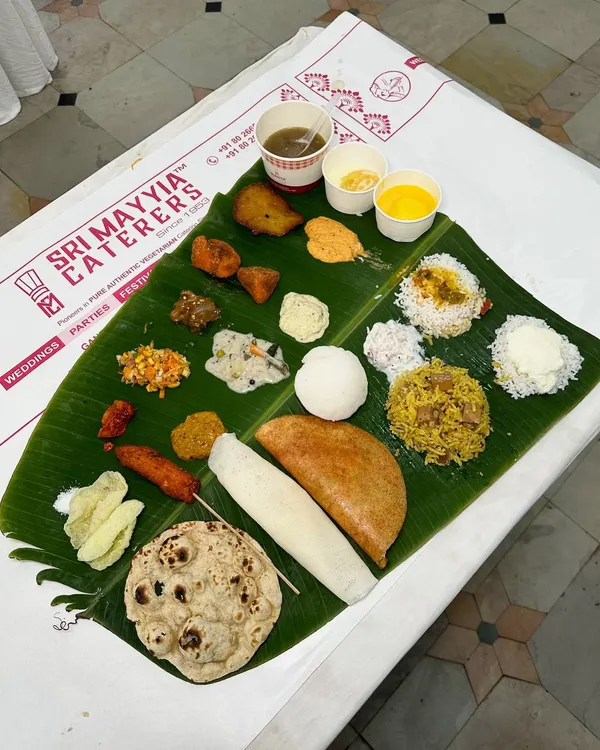This is our heart and soul on a plate, or rather, a banana leaf. A full South Indian vegetarian feast, complete with every traditional accompaniment, showcasing the authentic flavours and abundance we bring to your most important occasions.