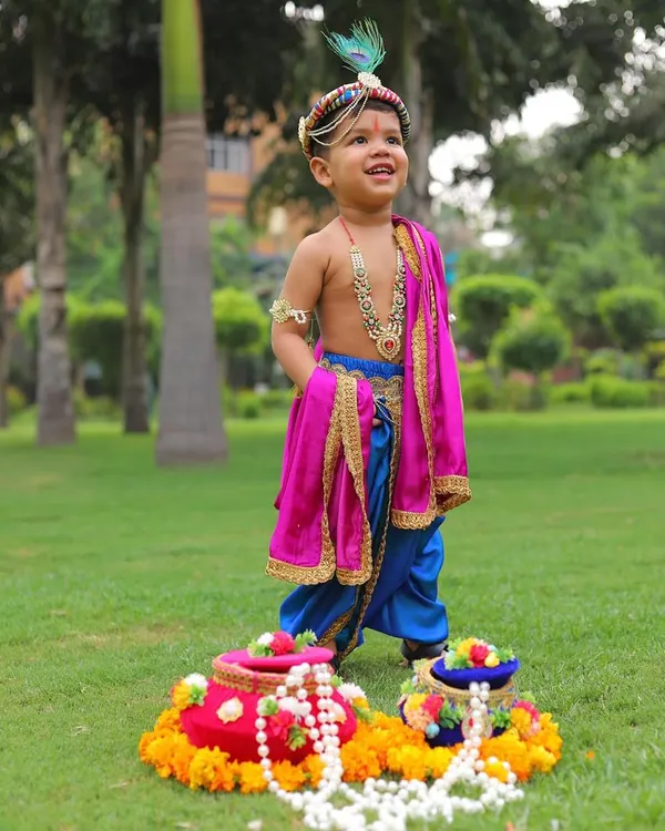 This is what childhood magic looks like. I designed this custom Kanha outfit for a little one's Janmashtami celebration, focusing on soft fabrics so he could be as playful and mischievous as Krishna himself. It’s moments like these that I love to create.