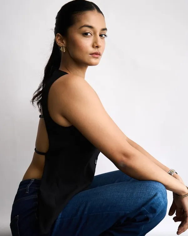 A classic example of my clean makeup work, featuring flawless skin and a simple, sleek ponytail for a model's test shoot.