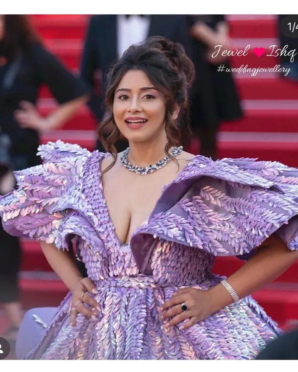 This is what I live for, seeing my creations on the world's most famous red carpet at the Cannes Film Festival. This stunning diamond and blue sapphire necklace set was designed to make a statement, complementing the dramatic silhouette of the gown. It’s all about creating that unforgettable, high-fashion moment.