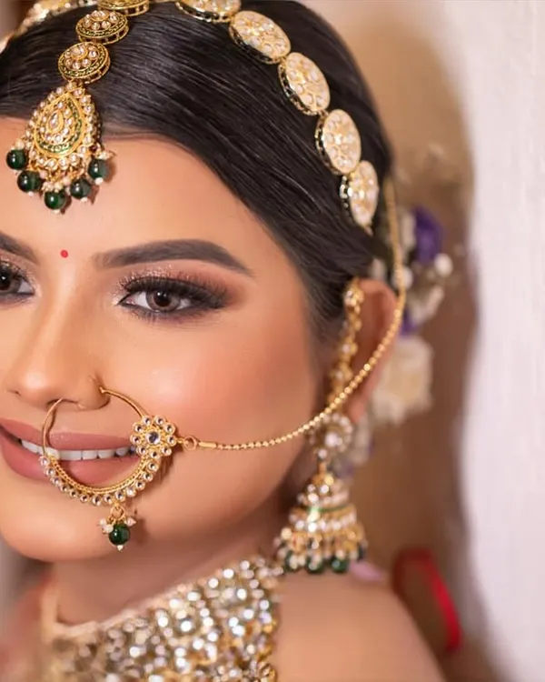 This is the bridal glow I live to create. This close-up shows the flawless, dewy skin and soft glam eyes that are my signature. It's all about looking like the best version of yourself, feeling happy and radiant on your wedding day.