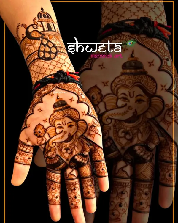 A powerful and detailed portrait of Lord Ganesha on the palm. This design is perfect for starting a new journey with blessings, featuring a cute Bal Ganesha figure.