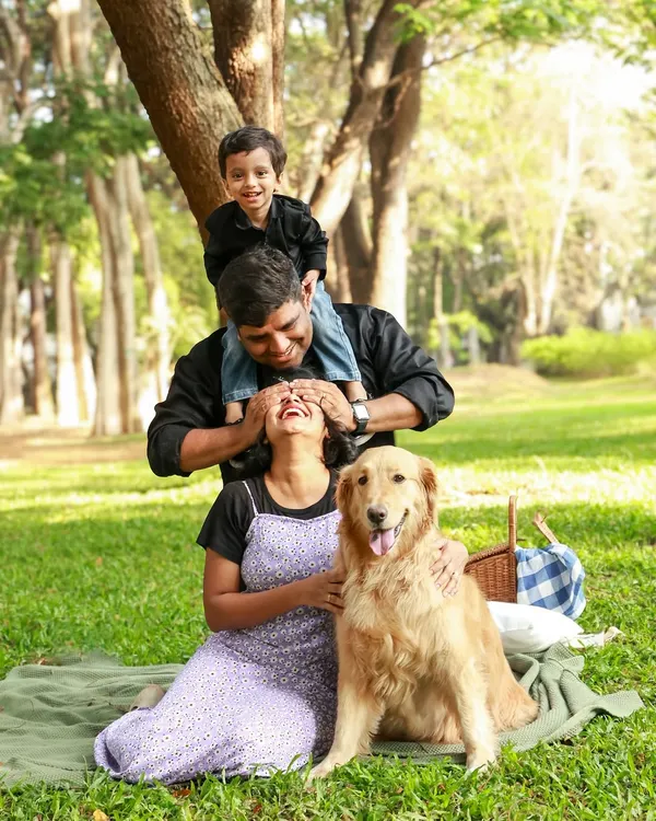 This is what it's all about. Unplanned, purely candid moments of love and laughter are my absolute favorite things to capture. This beautiful family portrait is full of the vibrant, joyful energy I strive to bring out in every session.