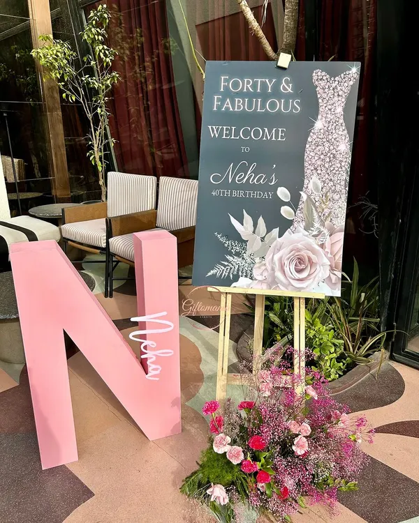 A chic and elegant welcome sign for a "Forty & Fabulous" birthday party. The design features a sophisticated color palette and a personalized monogram, showing my ability to cater to adult celebrations.