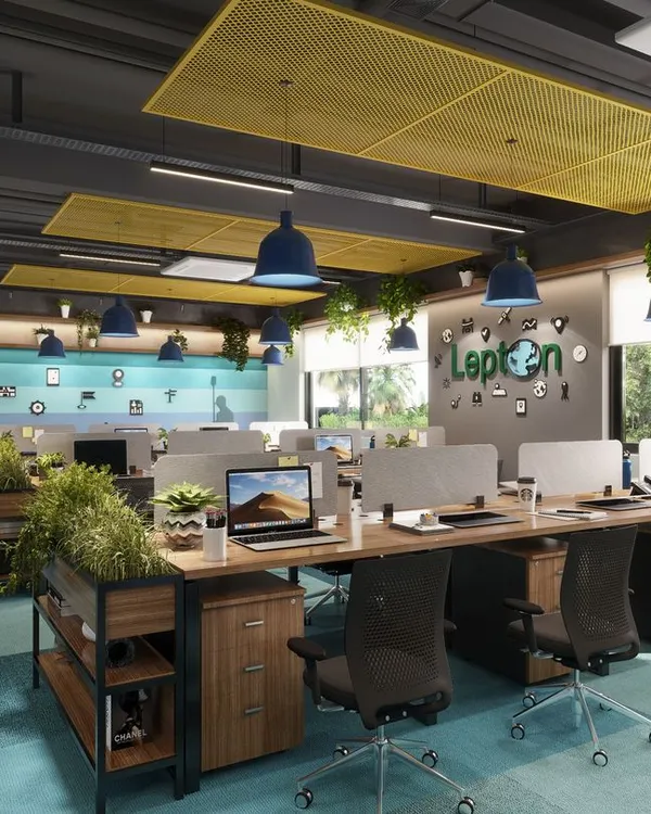 This view of the Lepton office showcases the long communal workstations and the custom wall mural that tells the company's story. The layout is designed to facilitate easy communication between team members.