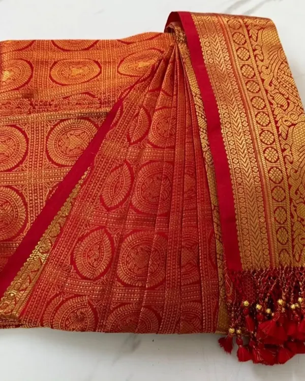 This is the final product: a gorgeous bridal Kanjeevaram, pre-pleated, pressed, and boxed for perfection. It's ready to be opened and worn, making your wedding day preparations smooth and effortless.