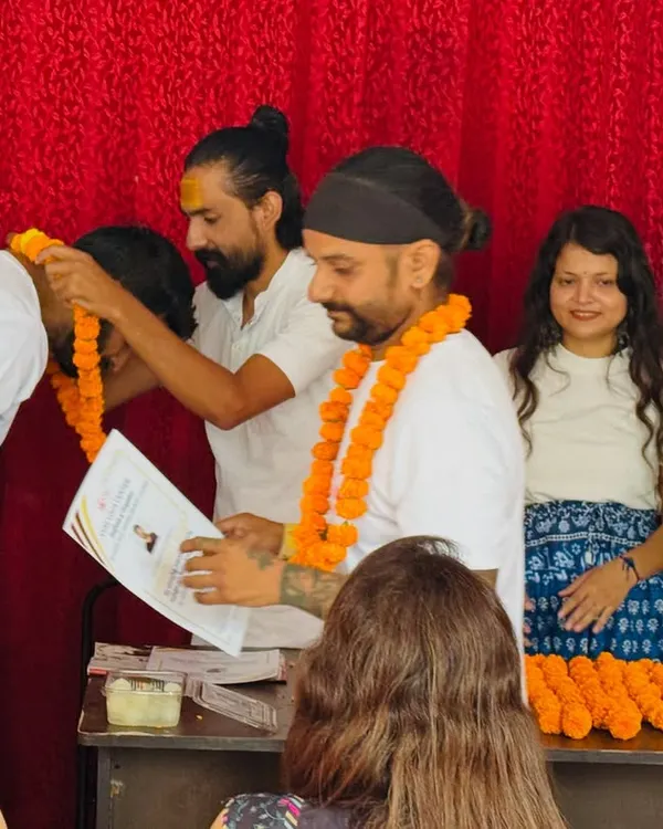 A moment from our YTTC closing ceremony. I am honoring a student with a traditional mala, celebrating his dedication and the completion of his journey with us.