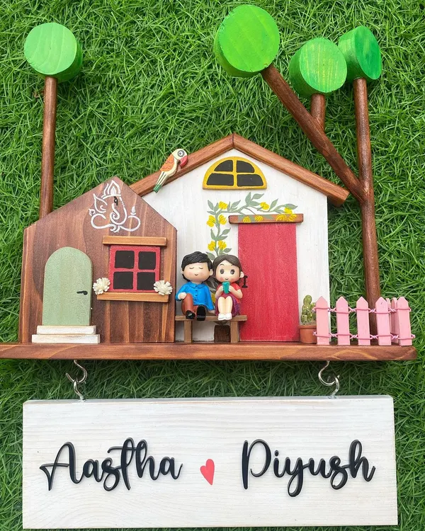 This is one of my most popular designs, and it's easy to see why! The detailed miniature house, complete with a couple figurine and a hand-painted Ganesha, brings so much warmth and personality to an entryway.