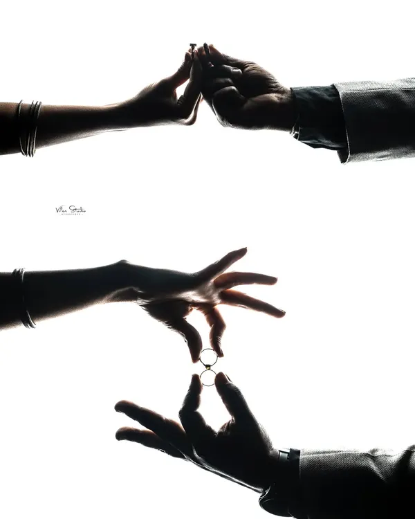 A creative silhouette shot telling the story of the engagement. This collage uses just hands and rings against a white background to symbolize the promise and union of the couple.