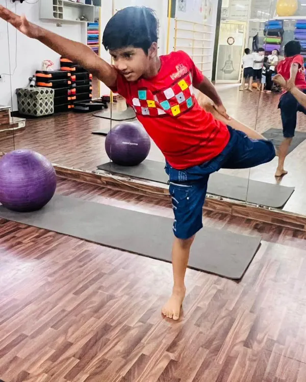 This young yogi shows amazing balance and focus in Natarajasana, the dancer's pose. Our kids' yoga classes are designed to build confidence and physical awareness.