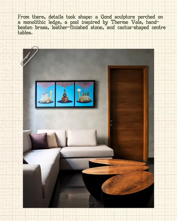 In this living space, a vibrant triptych of Gond art is perched on a monolithic ledge above the sofa. This placement transforms the traditional art form into a contemporary focal point, complemented by modern furniture and clean lines.