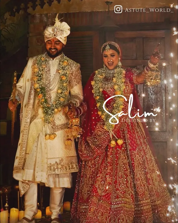This is what it's all about: a groom looking and feeling his best on his wedding day. I designed this classic ivory sherwani with intricate all-over embroidery and styled it with a matching safa and kalgi to create a complete, regal look for this beautiful celebration.