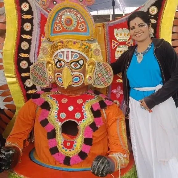 A behind-the-scenes moment from our performance at the 'Namma Karavali Utsava'. Here I am with a prop used in our semi-classical dance on the theme of nature.