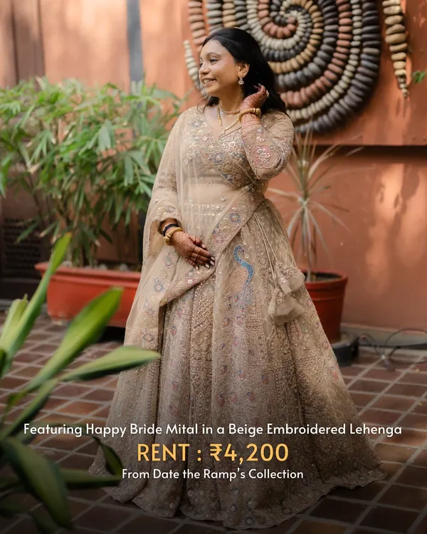 Meet Mital, a happy bride who looked absolutely radiant for her engagement in this beige embroidered lehenga. She chose to rent, making a smart and sustainable choice for her big day.