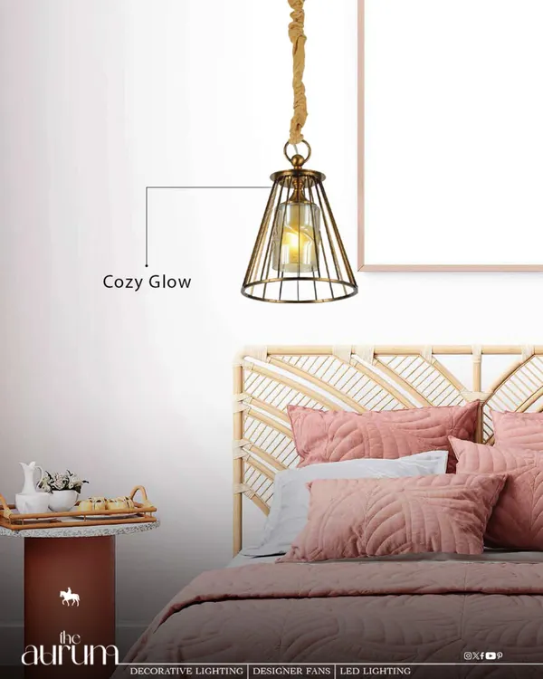 This industrial-style cage pendant with a rope detail adds a cozy glow to the bedroom. It's a perfect example of how I use lighting to create a feeling of luxury and comfort.